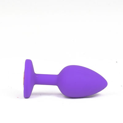 Силиконовая анальная пробка c фиолетовым камнем  S фиолетовая
