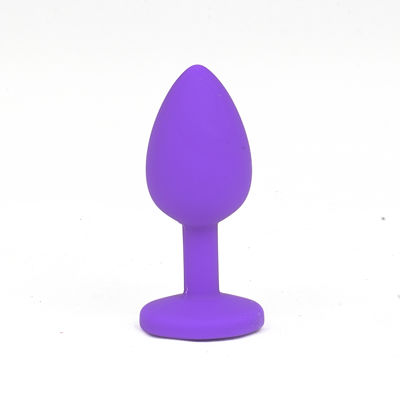 Силиконовая анальная пробка c фиолетовым камнем  S фиолетовая