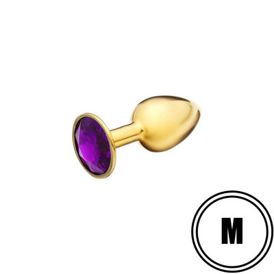 Золотистая анальная пробка с пурпурным камушком М